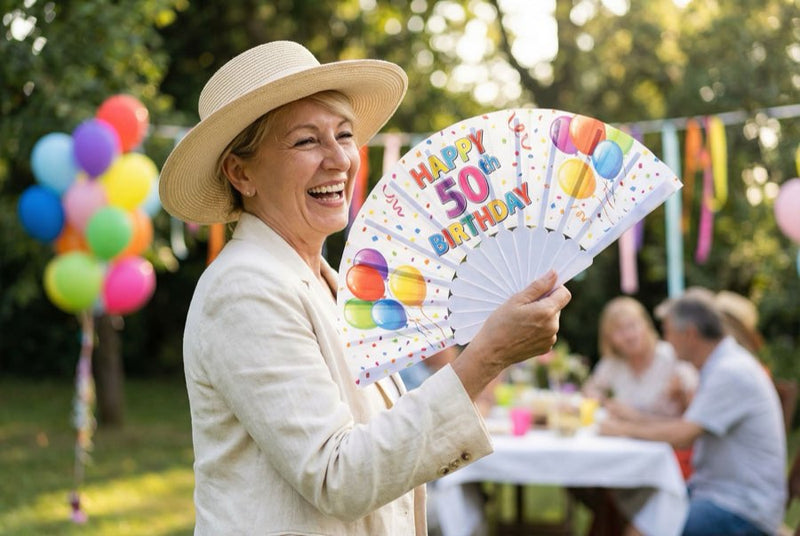Guests holding custom printed hand fans