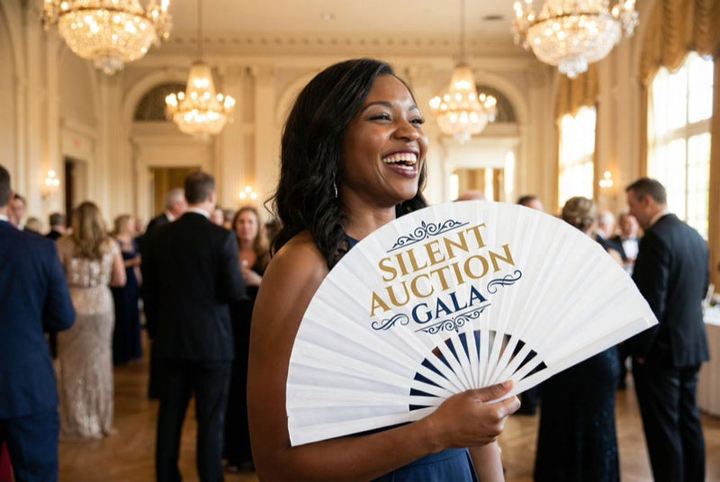 Custom bamboo fans in use — Custom Fans for Galas
