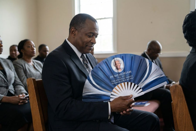 Custom hand fans at an event