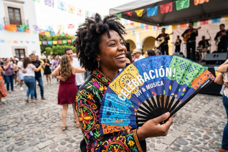 Custom bamboo fans in use — Custom Fans for Hispanic Heritage Events