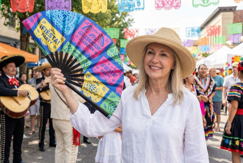 Guests holding custom printed hand fans