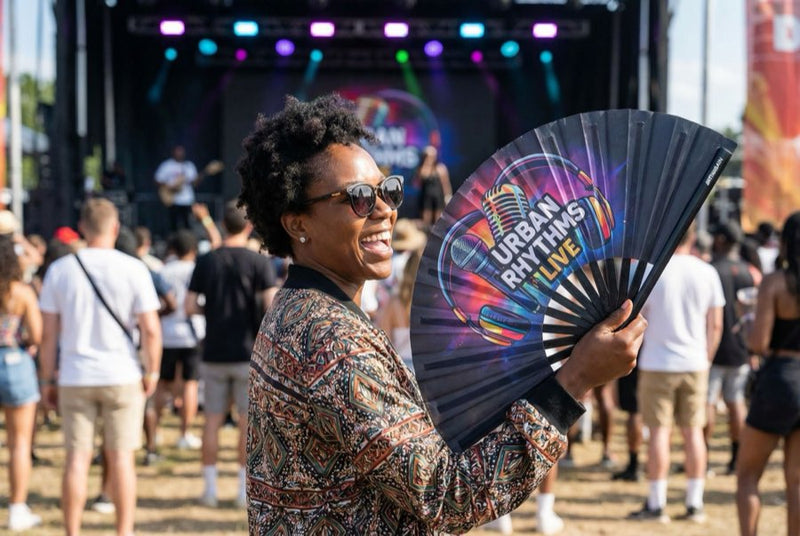 Custom bamboo fans in use — Custom Fans for Concerts