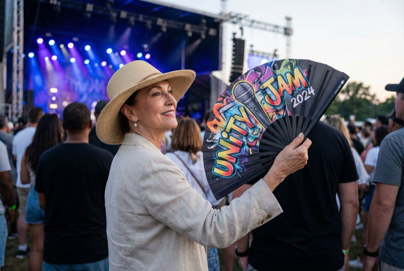 Guests holding custom printed hand fans