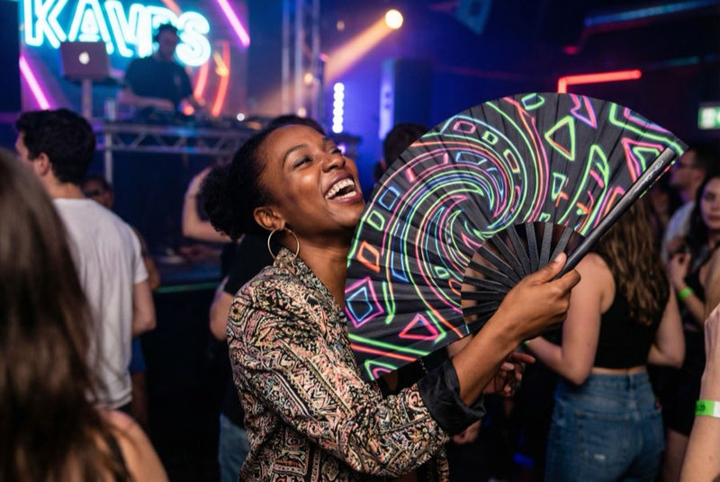 Custom bamboo fans in use — Custom Fans for Nightclubs