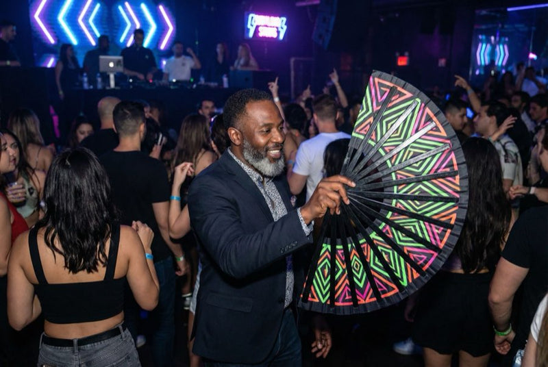 Custom hand fans at an event