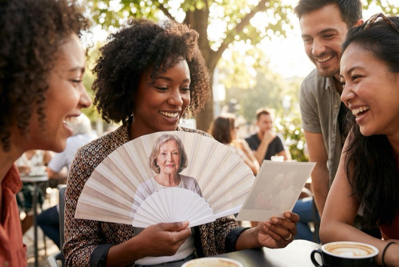 Custom bamboo fans in use — Custom Photo Fans | Print Your Face or Photo